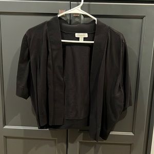 Black shrug